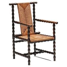 dark brown ebonized wicker chair