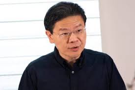 At first, it starts as a conversational comma, a mild distraction, but as the hours tick by, it graduates into something that you can't ignore. New Finance Minister Lawrence Wong Not Likely To Rock Fiscal Policy Boat Observers Government Economy The Business Times