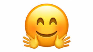 emoji de la carita con las manos abiertas