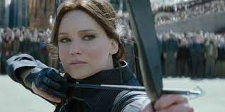 why snow laughs when katniss kills coin