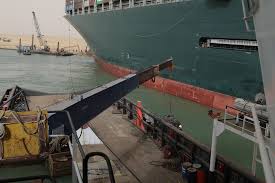The suez canal, a major waterway blocked by a huge container ship that ran aground on tuesday, remains blocked despite efforts to dislodge the vessel. Wx0jy7qpis36vm