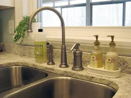 Before you replace your kitchen faucet you have to identify types of your faucet because there is the standard model, the touchless model is available for after placing the faucet there is some mounting hardware you will find which are coming with the new faucet. How To Replace A Kitchen Faucet Young House Love