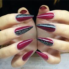 Stiletto nails are also known as talon or claw nails. Black And Black Glitter Stiletto Nail Art