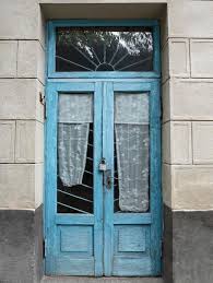 Vintage Glass Door With Blue Paint Chip