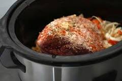 Should roast be covered with liquid in slow cooker?