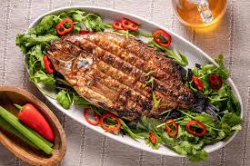 grilled whole fish stuffed with herbs