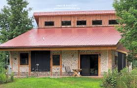 Cordwood Home With Double Shed Roof Is