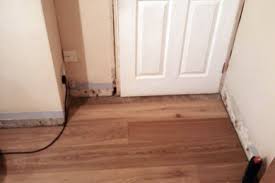 how to lay laminate in a doorway for