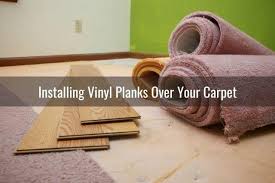 put vinyl planks over your carpet
