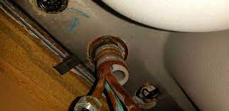 how to remove a stuck faucet nut