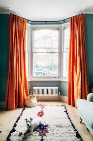 how to curtains for bay windows