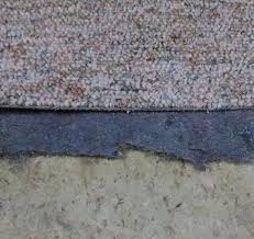 carpet over tile in bat or remove