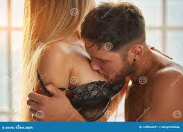 Man Kissing Woman`s Breast. Stock Image - Image of attractive, boobs:  105962477