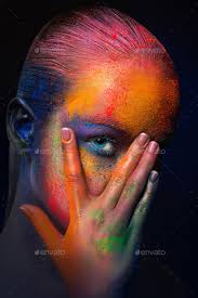 model with colorful art make up close