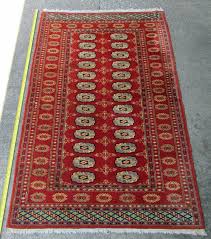 vtg red karachi wool rug from stan