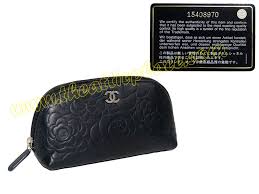 black lambskin camelia cosmetic pouch