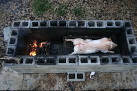 whole pig cooking in texas barbecue