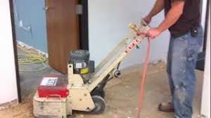 removing carpet glue from concrete