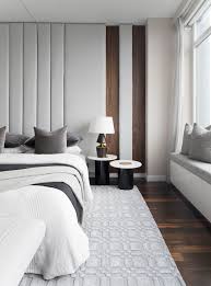 Luxury primary bedroom with fancy this large primary bedroom features a cozy bed accented with a stylish custom headboard fitted on the. Design By Img Luxury Bedroom Master Luxurious Bedrooms Master Bedrooms Decor