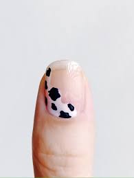 cow print nails with negative e