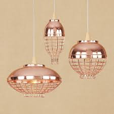Hanging copper pendant lights are one of our favorite little secrets around here. Industrial Style Wire Cage Hanging Pendant Light With Buffed Copper Shade Three Designs Available Beautifulhalo Com
