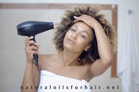 putting oil in hair before straightening
