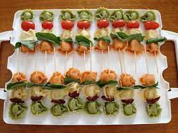 Salmon smoked cucumber appetizer bites appetizers cheese cream mini recipes party recipe finger dill easy. Tortellini Skewers And Diy Mugs Cold Finger Foods Finger Foods Food