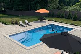 ite pools vs fiberglass pools the