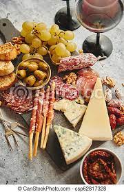 Simply put, it refers to the backwoods and rural areas of the state. Cold Snacks Board With Meats Grapes Wine Various Kinds Of Cheese Antipasto Platter Cold Meat And Cheese Board With Grapes Canstock