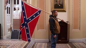jan 6 rioter who carried confederate