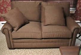 Rich Brown Loveseat With Accent Pillows