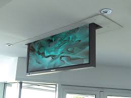 motorized tv lift on concrete ceiling
