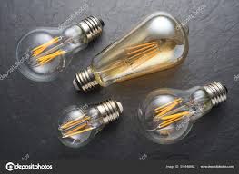 Transparent Led Filament Light Bulbs On Black Slate Background Stock Photo C Ha4ipiri 310448862