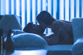 the couple kissing in the bed night