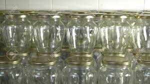 Clear glass square ribbed jars with metal lids, 4x4x4.25 in., square lattice clear glass jars with metal lids sturdy glass shakers with metal lids are the perfect complement to any restaurant or bistro table! Empty Glass Jars For Food Storage Close Up Many Unlabeled Glass Stock Photo Picture And Royalty Free Image Image 116896782