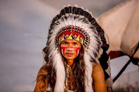 american indian man with headdress and