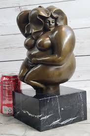cubby chair femme bronze sculpture