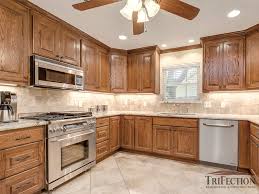 oak custom cabinets by trifection