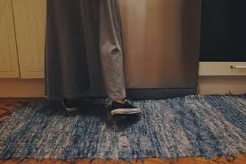 placing a fridge on a carpeted floor