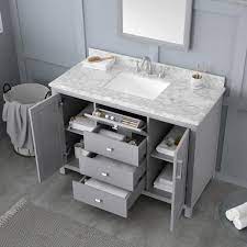 Bathroom vanities offering style and storage. Home Decorators Collection Rockleigh 48 In W X 22 In D Bath Vanity In Pebble Grey With Marble Vanity Top In Carrara White With White Basin Rockleigh 48pg The Home Depot