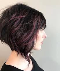 Sleeking the side section of hair over towards the front accentuates the angles in her face and creates a dramatic bang. Picture Of Short Angled Bob And Dark Purple Balayage Highlights On Black Hair Looks Wow