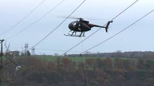 helicopter helps repair power line in