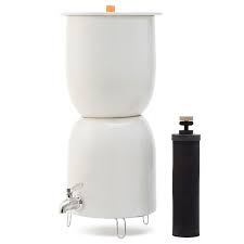 Use a cleaning pad similar to a scotch brite pad or a stiff toothbrush and gently scrub the outside of the black berkey filters under cool running water. Ceramic Water Dispenser With Built In Berkey Water Filter Berkey Water Filter Ceramic Water Filter Berkey Water
