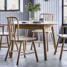 rebecca round extendable oak dining table