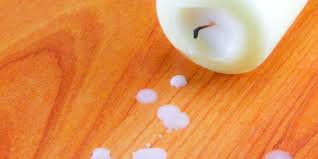 how to get candle wax off wood floor