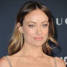 olivia wilde flashes her toned abs in a