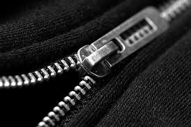 how to put a zipper back on track