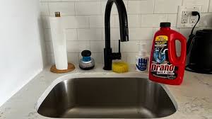 how to clear a clogged drain the new
