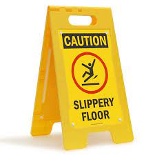 caution slippery standing floor sign