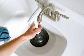 what a drain plunger is and how to use it